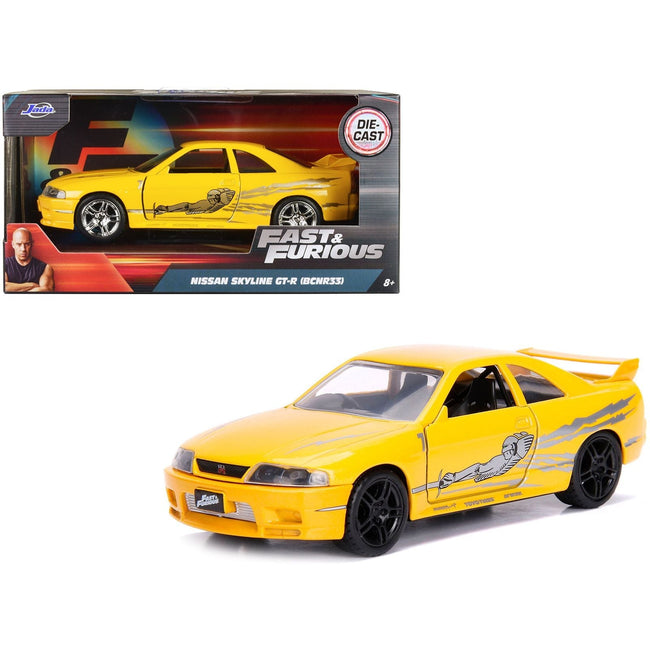 Leon's Nissan Skyline GT-R (BCNR33) Yellow Metallic with Graphics "Fast & Furious" Series 1/32 Diecast Model Car by Jada-Jada-ModelCars.com