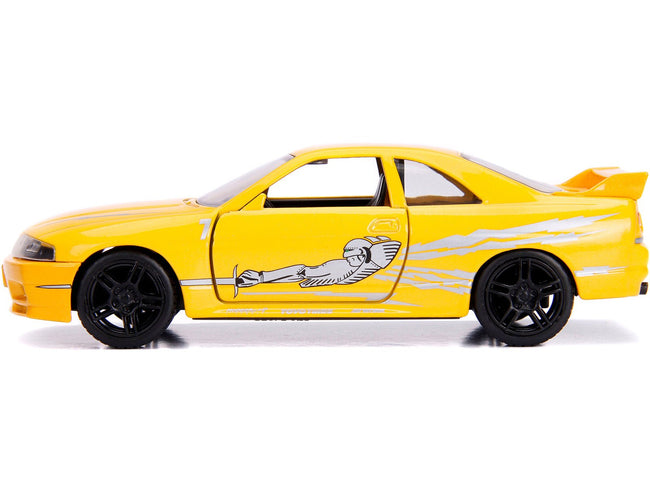 Leon's Nissan Skyline GT-R (BCNR33) Yellow Metallic with Graphics "Fast & Furious" Series 1/32 Diecast Model Car by Jada-Jada-ModelCars.com