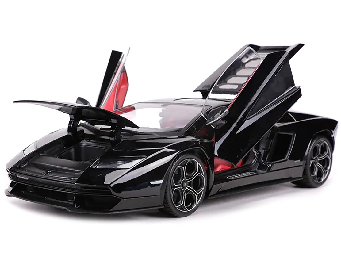 Black Lamborghini model car with open doors