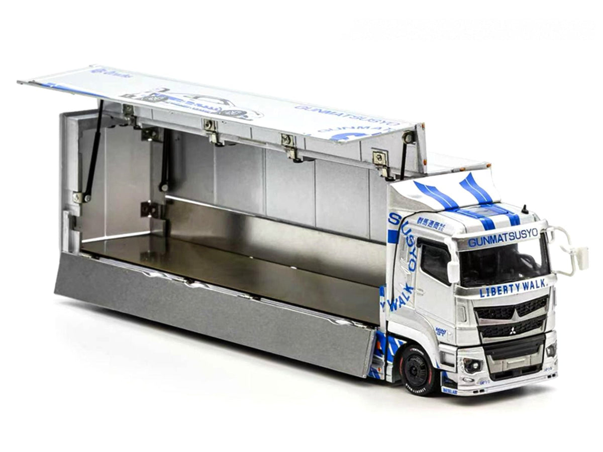 Mitsubishi Fuso Super Great Transporter RHD (Right Hand Drive) "LB-Trucks - Gunmatsusyo" Silver Metallic with Blue Graphics "Tokyo Auto Salon (TAS) 2026 Exclusive" 1/64 Diecast Model by GCD-GCD-ModelCars.com