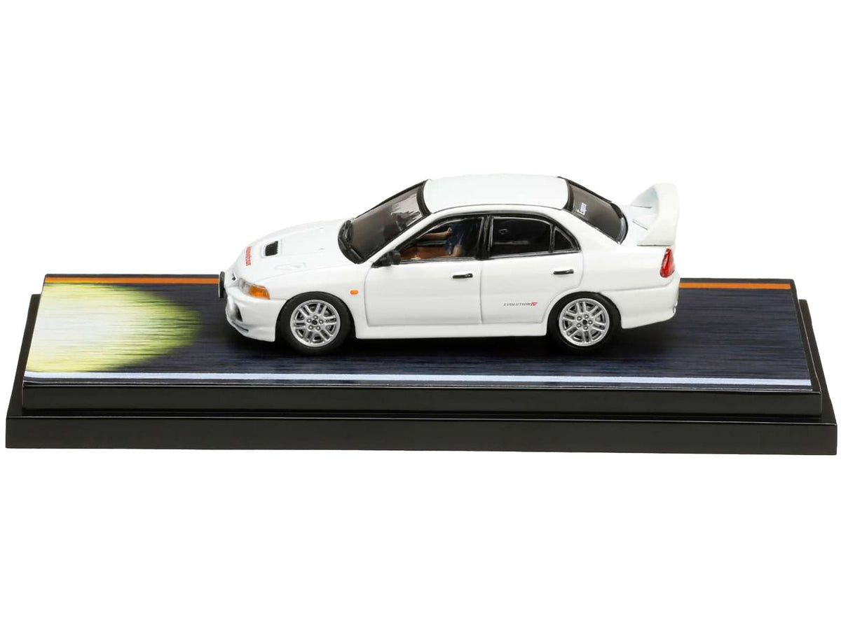 Mitsubishi Lancer RS Evolution IV RHD (Right Hand Drive) White "Monstar" with Seiji Iwaki Driver Figure "Initial D" (1995-2013) Manga 1/64 Diecast Model Car by Hobby Japan-Hobby Japan-ModelCars.com