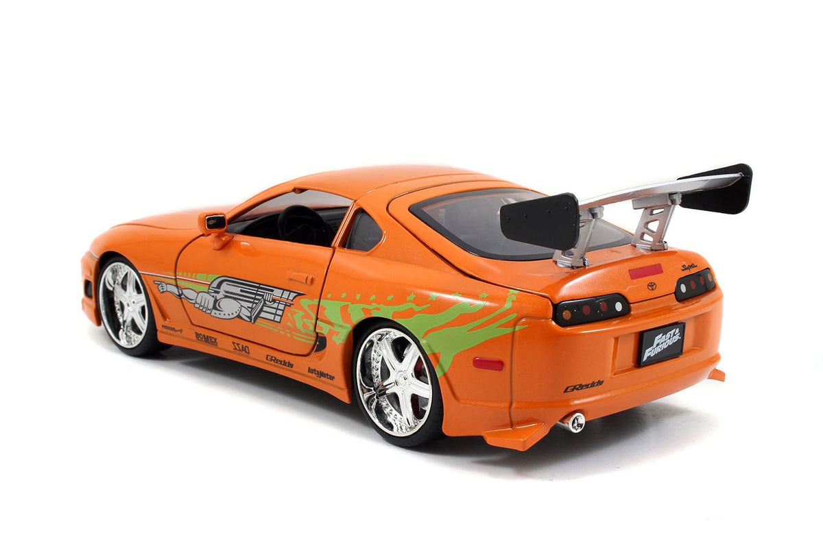 Model Kit Toyota Supra Metallic Orange with Brian Diecast Figure "Fast & Furious" Movie "Build N' Collect" 1/24 Diecast Model Car by Jada-Jada-ModelCars.com
