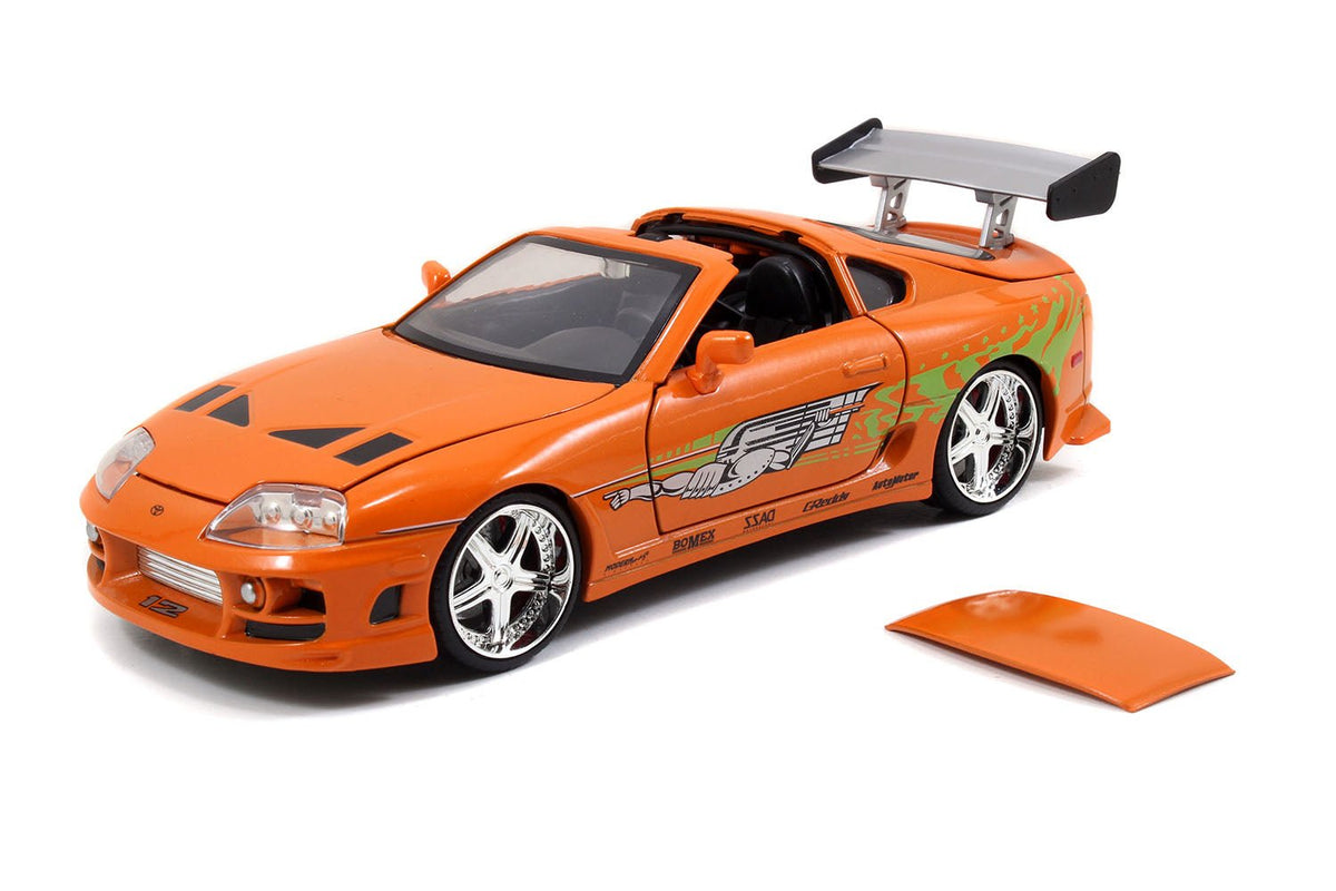 Model Kit Toyota Supra Metallic Orange with Brian Diecast Figure "Fast & Furious" Movie "Build N' Collect" 1/24 Diecast Model Car by Jada-Jada-ModelCars.com