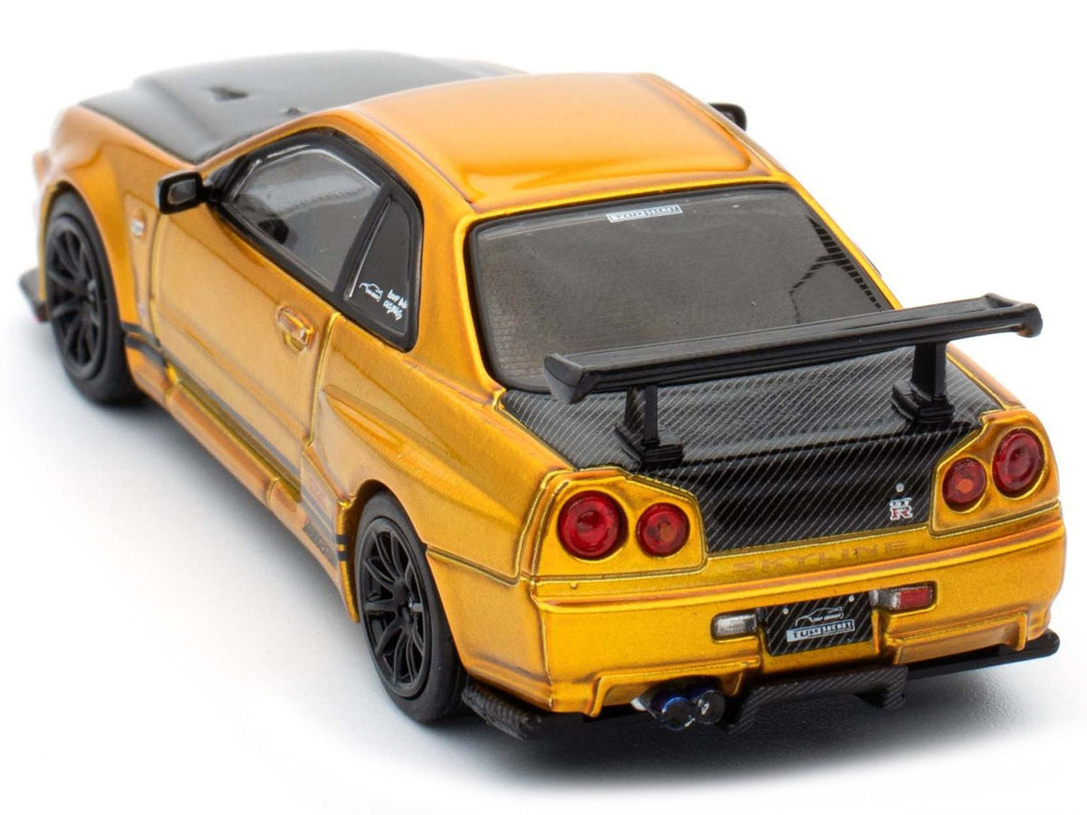 Nissan Skyline GT-R (R34) "Top Secret" RHD (Right Hand Drive) Gold Metallic with Carbon Hood and Trunk "Tokyo Auto Salon 2024 - Malaysia Diecast Expo 2024" 1/64 Diecast Model Car by Inno Models-Inno Models-ModelCars.com