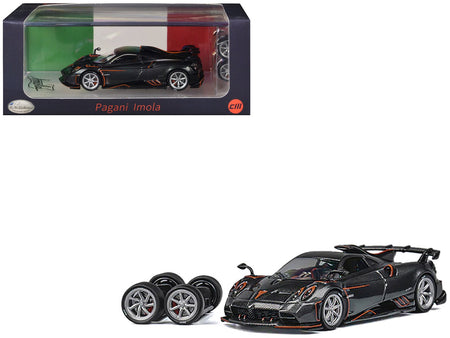 Pagani Imola Dark Gray Metallic with Carbon and Orange Accents with Extra Wheels 1/64 Diecast Model Car by CM Model-CM Models-ModelCars.com