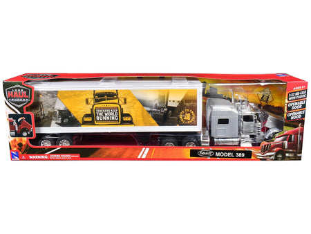 Peterbilt 389 Truck Silver Metallic with Dry Van Trailer "Trucker Keep The World Running" "Long Haul Truckers" Series 1/32 Diecast Model by New Ray-New Ray-ModelCars.com