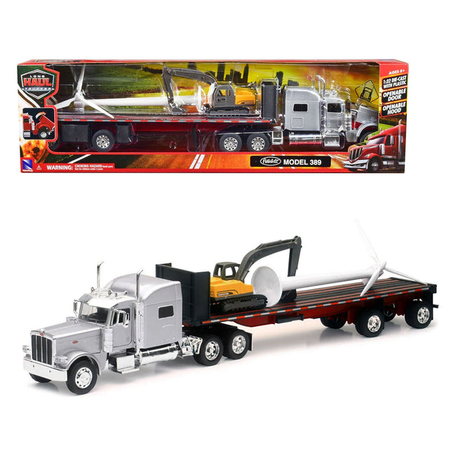 Peterbilt 389 Truck with Flatbed Trailer Silver Metallic with Excavator and Wind Turbine "Long Haul Truckers" Series 1/32 Diecast Model by New Ray - New Ray - ModelCars.com