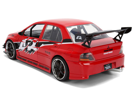 Sean's Mitsubishi Lancer Evolution IX RHD (Right Hand Drive) Red with Graphics "The Fast and the Furious: Tokyo Drift" (2006) Movie "Fast & Furious 25 Years" Series 1/24 Diecast Model Car by Jada-Jada-ModelCars.com