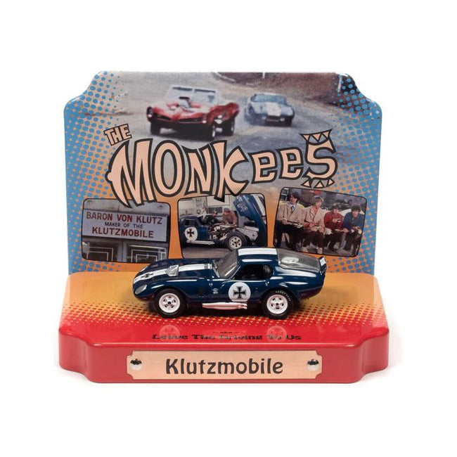 Shelby Cobra Daytona "Klutzmobile" Blue Metallic with White Stripes "The Monkees" with Collectible Tin Display "Silver Screen Machines" Series 1/64 Diecast Model Car by Johnny Lightning-Johnny Lightning-ModelCars.com