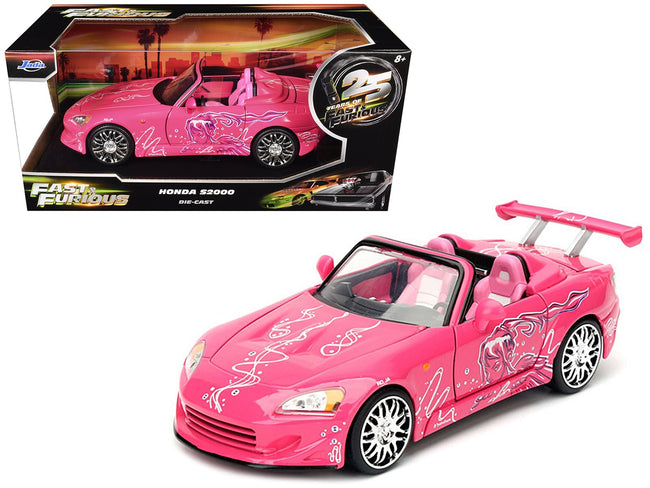 Suki's 2001 Honda S2000 Convertible Pink with Graphics "25 Years of Fast & Furious" "2 Fast 2 Furious" (2003) Movie 1/24 Diecast Model Car by Jada-Jada-ModelCars.com