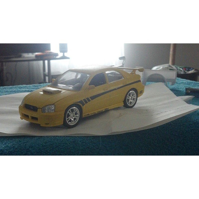 Tamiya 1/24 Subaru Impreza STI - Tamiya - ModelCars.com