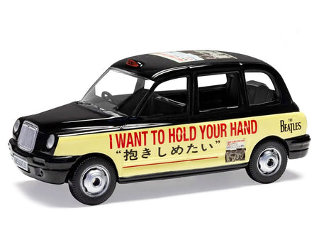 The Beatles London Taxi RHD (Right Hand Drive) "I Want To Hold Your Hand" Black and Cream with Graphics Diecast Model by Corgi-Corgi-ModelCars.com