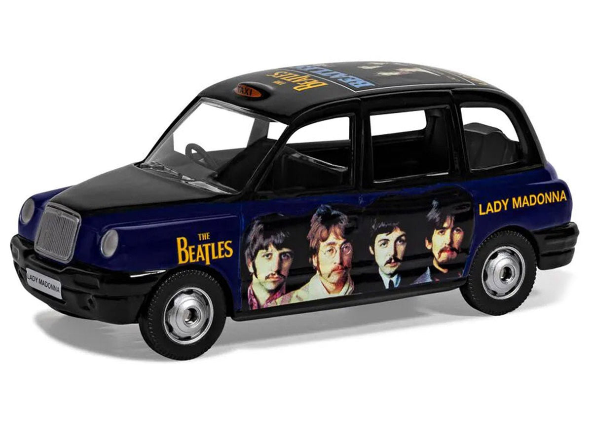 The Beatles London Taxi RHD (Right Hand Drive) "Lady Madonna" Black and Dark Blue with Graphics Diecast Model by Corgi-Corgi-ModelCars.com