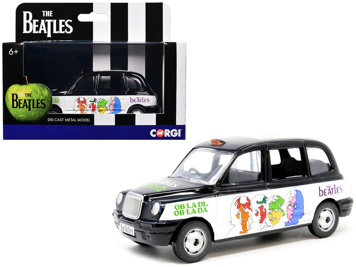The Beatles London Taxi RHD (Right Hand Drive) "Ob-La-Di Ob-La-Da" Black and White with Graphics Diecast Model by Corgi-Corgi-ModelCars.com