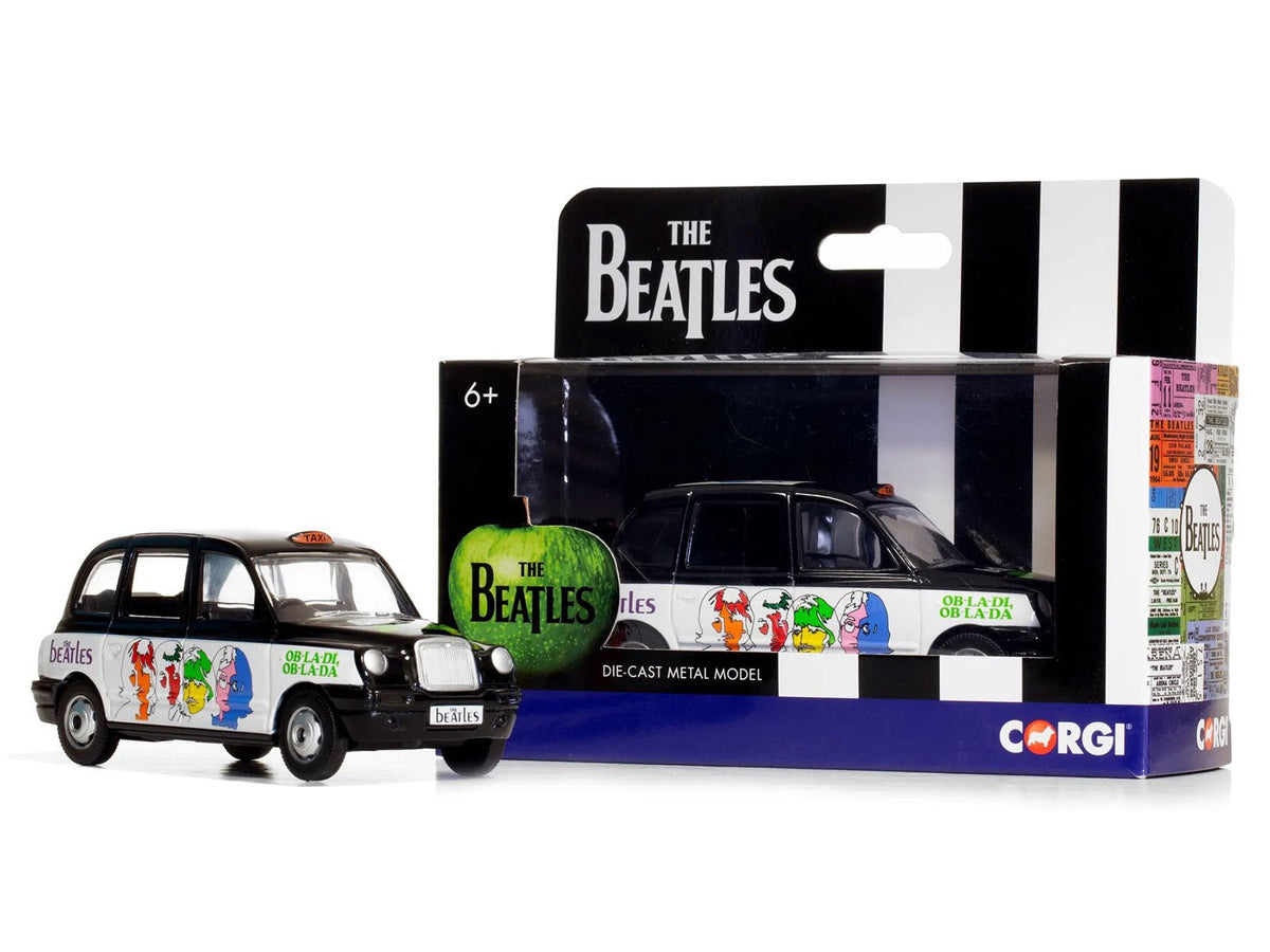 The Beatles London Taxi RHD (Right Hand Drive) "Ob-La-Di Ob-La-Da" Black and White with Graphics Diecast Model by Corgi-Corgi-ModelCars.com