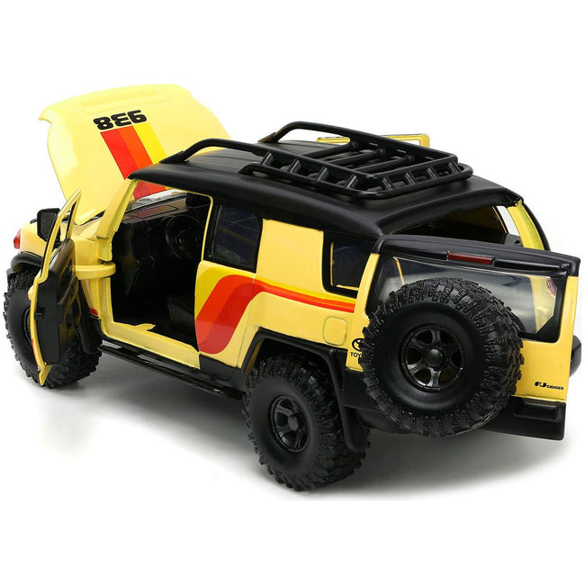 Toyota FJ Cruiser 938 Cream with Matt Black Top with Roof Rack and Stripes "KC Hilites" with Extra Wheels "Just Trucks" Series 1/24 Diecast Model Car by Jada - Jada - ModelCars.com