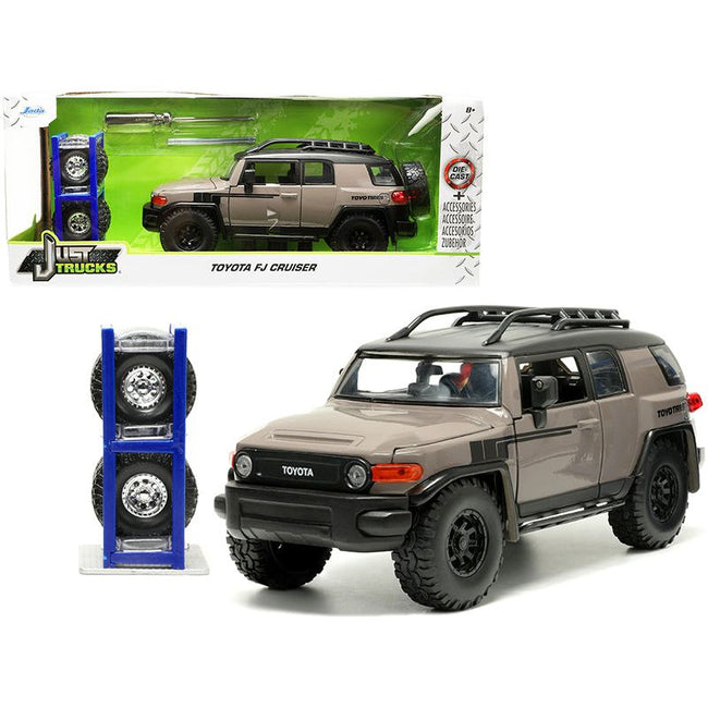 Toyota FJ Cruiser with Roof Rack Brown and Black "Toyo Tires" with Extra Wheels "Just Trucks" Series 1/24 Diecast Model Car by Jada-Jada-ModelCars.com