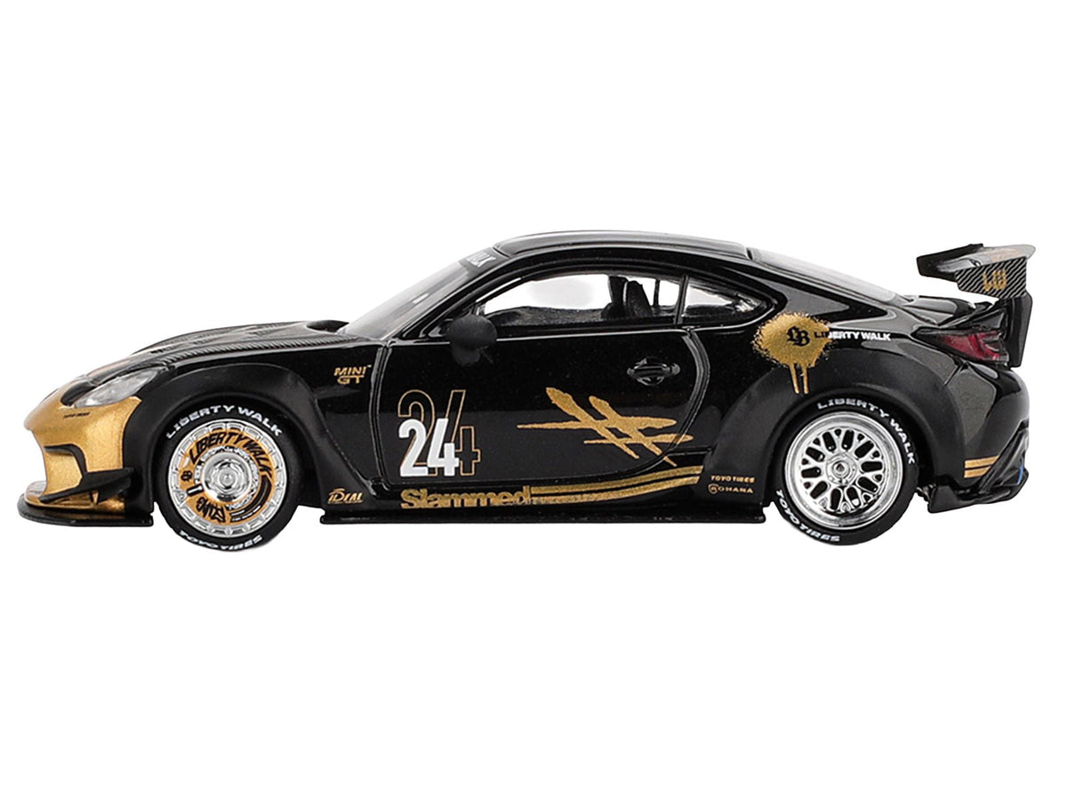 Toyota GR86 "LB-Nation - Liberty Walk" #24 Black with Carbon Hood and Gold Graphics Limited Edition 1/64 Diecast Model Car by Mini GT-Mini GT-ModelCars.com