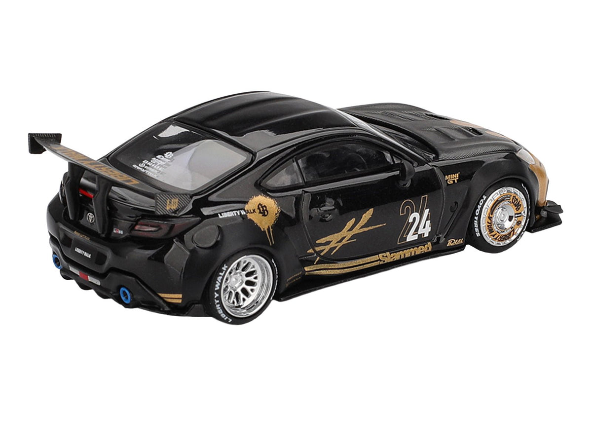 Toyota GR86 "LB-Nation - Liberty Walk" #24 Black with Carbon Hood and Gold Graphics Limited Edition 1/64 Diecast Model Car by Mini GT-Mini GT-ModelCars.com