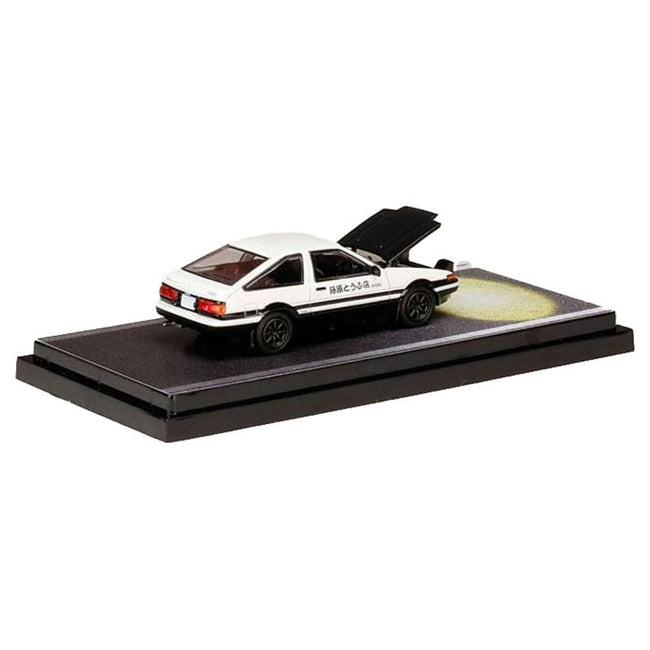 Toyota Sprinter Trueno (AE86) RHD (Right Hand Drive) White and Black with Carbon Hood "Engine Mounted Model VS Tomoyuki Tachi" "Initial D" (1995 - 2013) Manga 1/64 Diecast Model Car by Hobby Japan - Hobby Japan - ModelCars.com