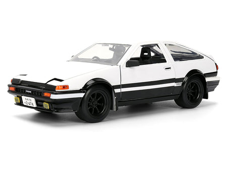 Toyota Trueno (AE86) RHD (Right Hand Drive) White and Black with Graphics and Takumi Diecast Figure "Initial D" (1998-2021) TV Series "Anime Hollywood Rides" Series 1/24 Diecast Model by Jada-Jada-ModelCars.com