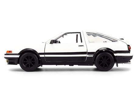 Toyota Trueno (AE86) RHD (Right Hand Drive) White and Black with Graphics and Takumi Diecast Figure "Initial D" (1998-2021) TV Series "Anime Hollywood Rides" Series 1/24 Diecast Model by Jada-Jada-ModelCars.com