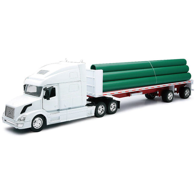 Volvo VN - 780 Truck with Flatbed Trailer and Long Pipes White "Long Haul Truckers" Series 1/32 Diecast Model by New Ray - New Ray - ModelCars.com