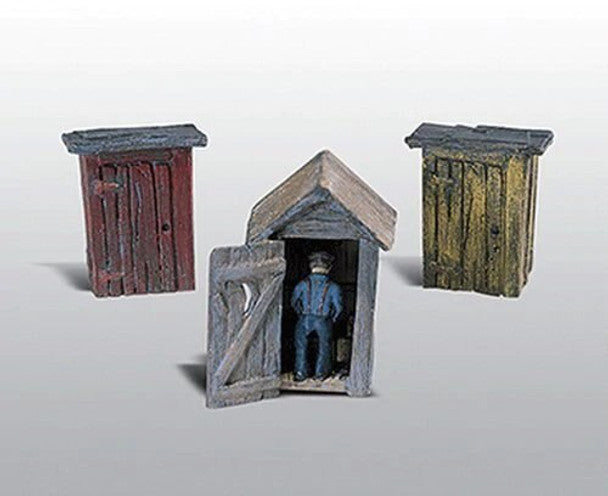 3 OUTHOUSES & MAN