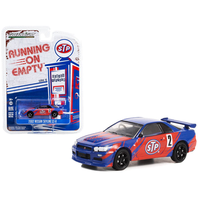 2002 Nissan Skyline GT - R (R34) 2 Blue with Red Graphics "STP" "Running on Empty" Series 15 1/64 Diecast Model Car by Greenlight - Greenlight - ModelCars.com