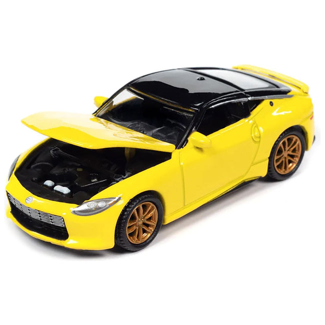 2023 Nissan Z Ikazuchi Yellow with Super Black Top "Import Legends" Limited Edition 1/64 Diecast Model Car by Auto World - Autoworld - ModelCars.com