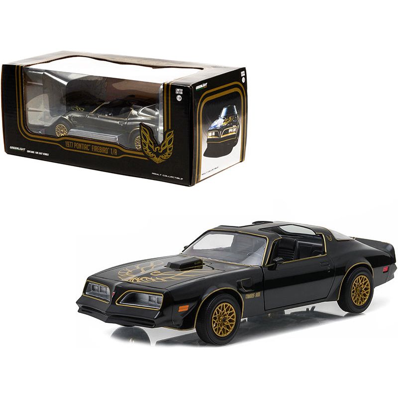 1977 Pontiac Firebird Trans Am T/A Starlite Black with Golden Eagle Hood and Stripes 1/24 Diecast Model Car by Greenlight