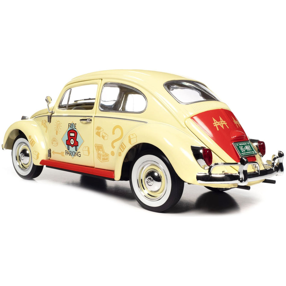 1963 Volkswagen Beetle Yukon Yellow with "Monopoly" Graphics "Free Parking" and Mr. Monopoly Resin Figure 1/18 Diecast Model Car by Auto World