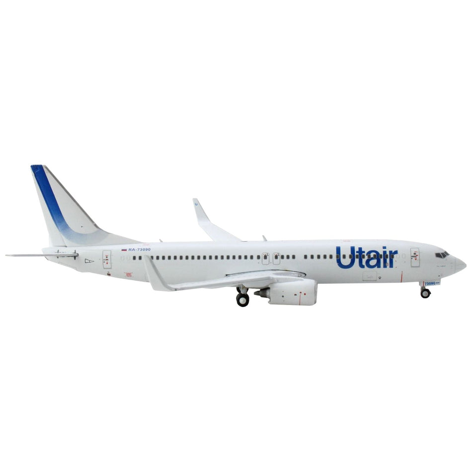 Boeing 737-800 Commercial Aircraft "Utair" White with Blue Tail Stripes 1/400 Diecast Model Airplane by GeminiJets